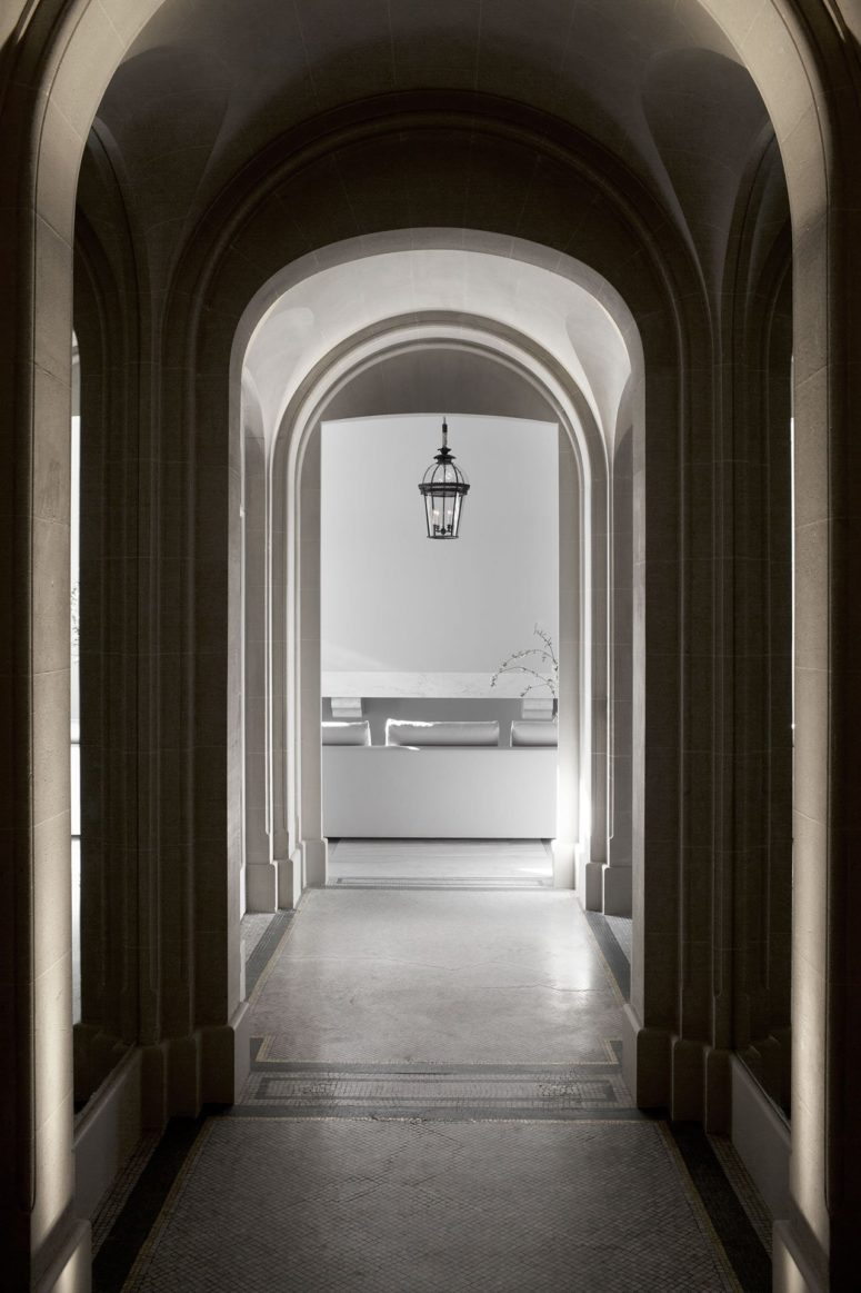 Arched windows and walkways add elegance to the apartment