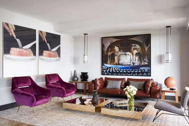 living room with two cool coffee tables made of mirrors The living room is done with super bright furniture, catchy mirror coffee tables and interesting artworks