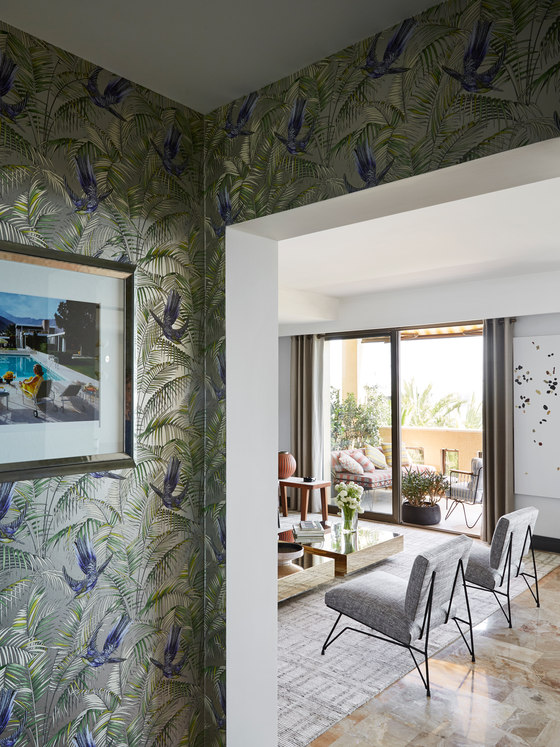 Here there's an entrance to the large balcony decorated in Mediterranean styles with a mid century feel Here there's an entrance to the large balcony decorated in Mediterranean styles with a mid-century feel