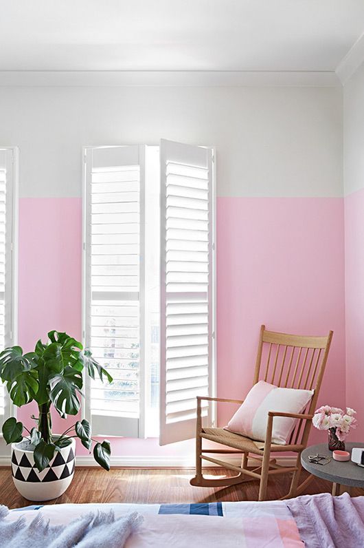 a color blocked wall in white and pink is a bold and bright idea to cheer up the space
