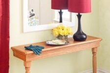 07 a simple wooden half table as an entryway console will hold everything you need