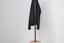 11 a very simple coat rack with an additional stool as a base of it is a great combo for a tiny space