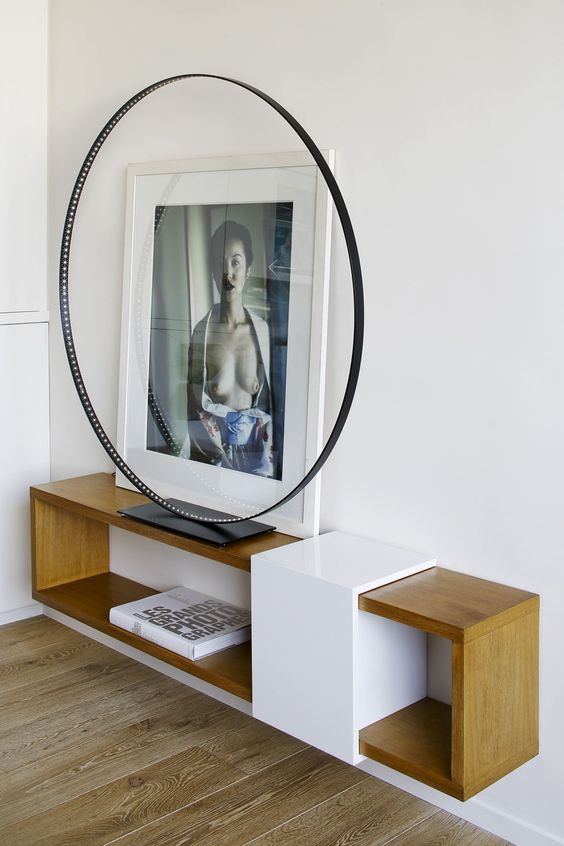 a mid-century modern plywood console with an open storage space is a comfy idea for using
