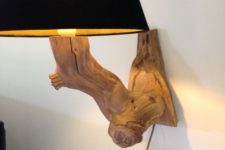 17 a chic wall Lamp of a weathered old oak branch with a black velvet lampshade for a statement