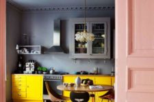 17 a graphite grey kitchen color blocked with sunny yellow lower cabinets and a gorgeous pendant lamp