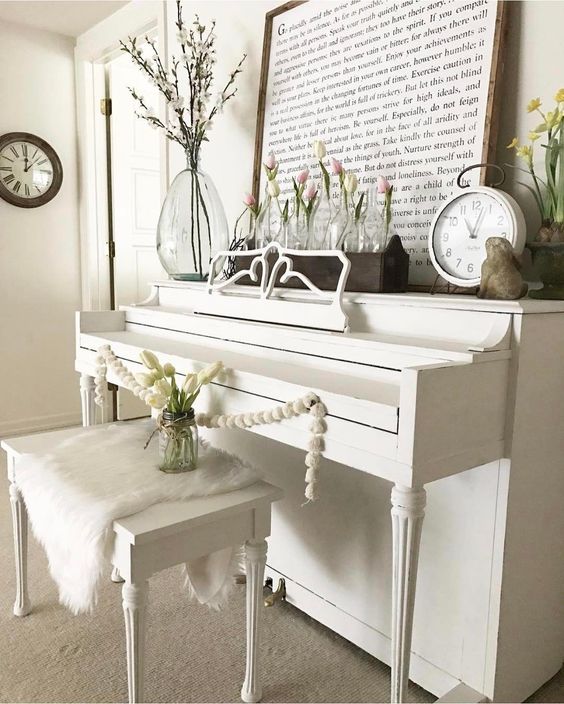 a spring bulb and bloom display on the piano, a large artwork for a spring display