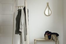 19 a modern wooden coat rack with three sides and hooks for hanging everything you want
