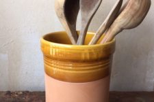 19 a stylish ceramic utensil holder is a chic idea for many kitchens