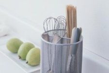 20 a mesh utensil holder is a simple and modern idea