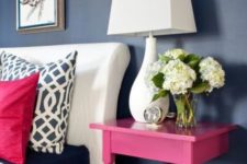 20 a nightstand made of a cut table and painted hot pink to make a perfect fit for the space