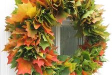 21 a super lush fall wreath made of real fall laves of various colors will make a statement both indoors and outdoors