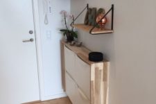 23 a very narrow floating console of an IKEA shoe cabinet with a plywood waterfall tabletop for a tiny entryway