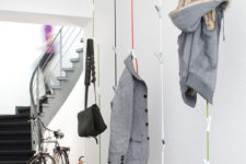 23 these hanging coat racks have 4 adjustable Y shaped hooks to hold your coats and bags and a weight at the bottom to keep the rack from swaying too much