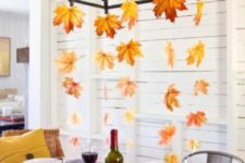 25 if you have a chandelier hanging over the table, hang some fall leaves on threads down