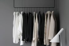 26 hang a rail to make your clothes part of your bedroom decor