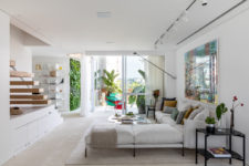 01 This gorgeous contemporary apartment was a 90s dwelling, which was renovated and given a modern feel