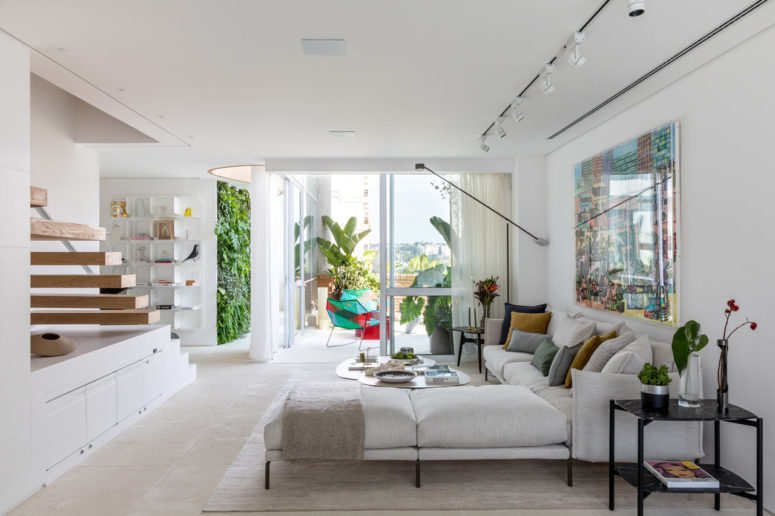 This gorgeous contemporary apartment was a 90s dwelling, which was renovated and given a modern feel
