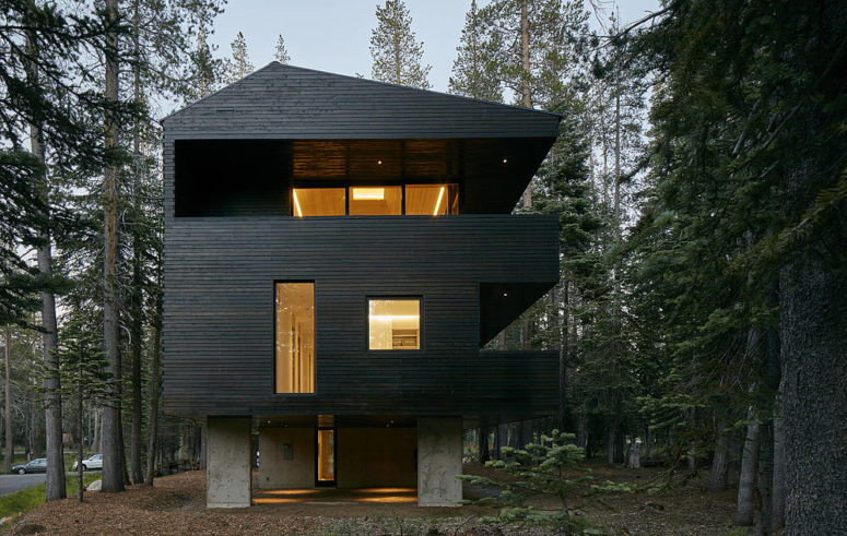 The house is clad with pine wood with treating that was used for 1000 year old Norwegian barns, that gives a slight Scandi feeling to the house