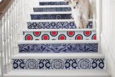 02 give your stairs a bold look decorating them with bright printed wallpaper – it may be different for each step