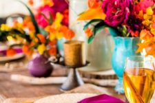 02 set a tablescape with orange, mustard, hot pink and purple hues to remember this Thanksgiving