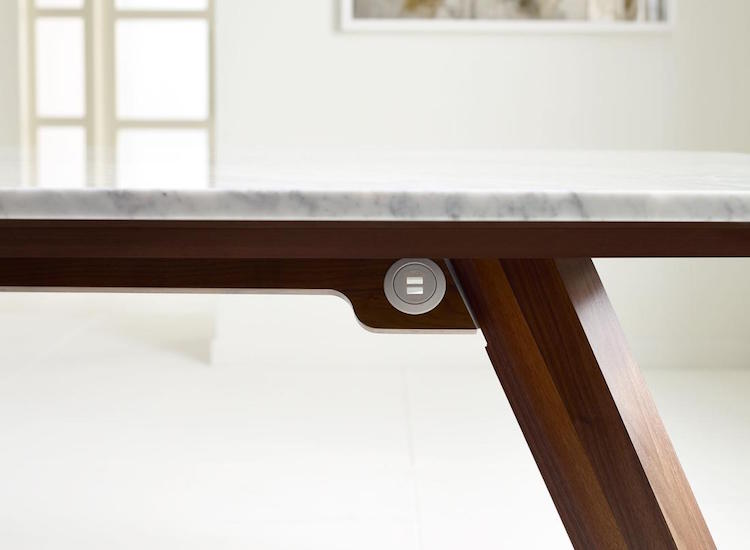 The top is available in a number of materials including wood, stone and glass to let you personalize it as much as possible
