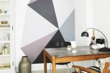 03 a cozy home office nook that is visually separated from the rest of the space with a geometric color block wall