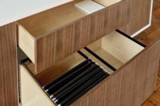 04 Stylish and simple drawers of the matching credenza will allow storing everything you want inside gettign rid of usual clutter on the desk