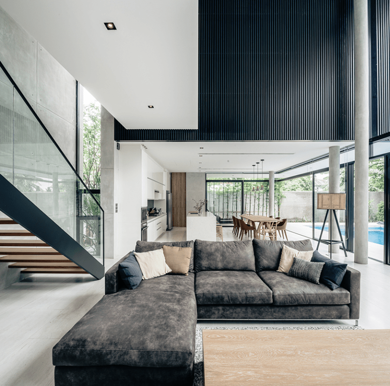 The kitchen and dining space are united into one open layout with the living space and cna be opened to the pool