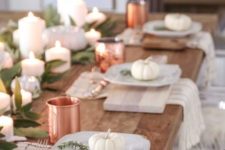 05 a natural tablescape with cutting boards, white pumpkins, greenery and copper mugs for a chic touch