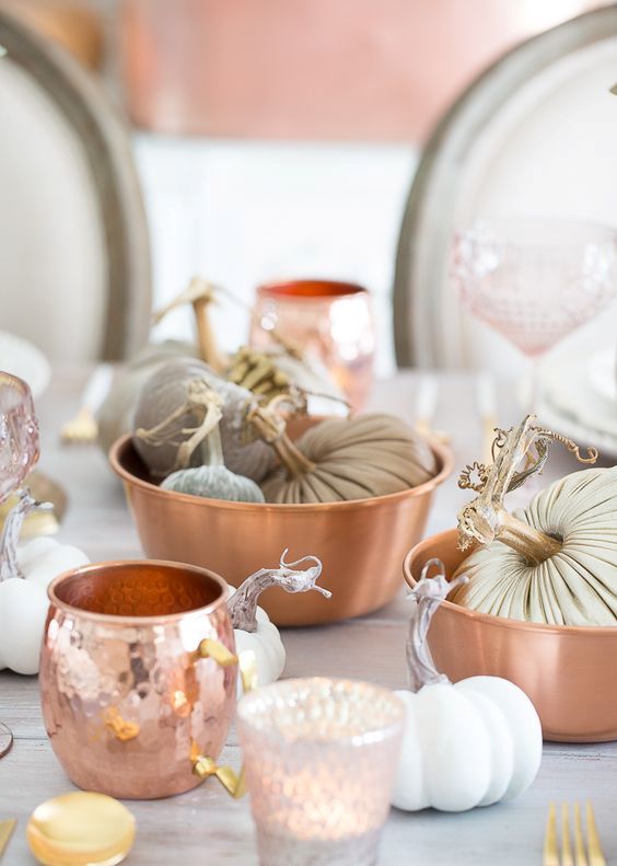 copper mugs and bowls with fabric pumpkins will be a cool decoration for your table setting