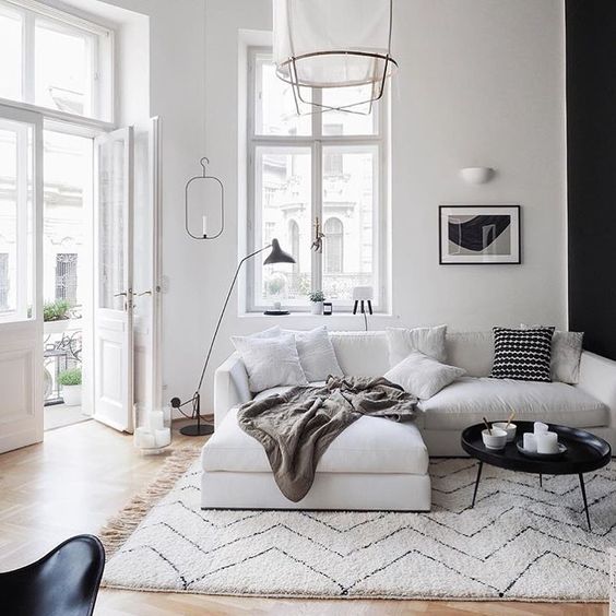 the only print in the space is chevron, and the rest of the space is kep airy and neutral