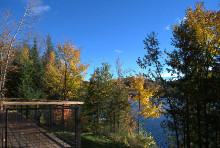 This deck outside is used to extend the living space and to dine or spend time outdoors when the weather is fine