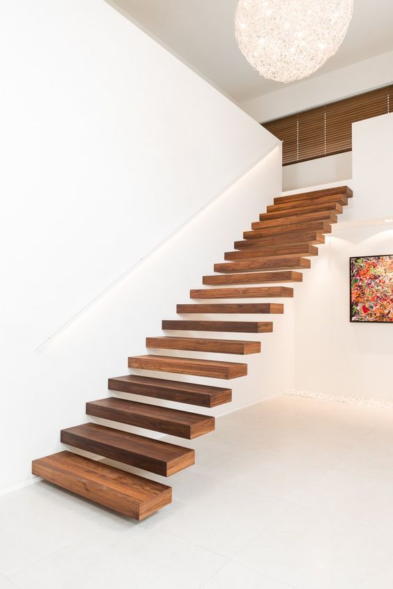 the secret of seamless staircases is attaching them to walls or railings to make them look ethereal