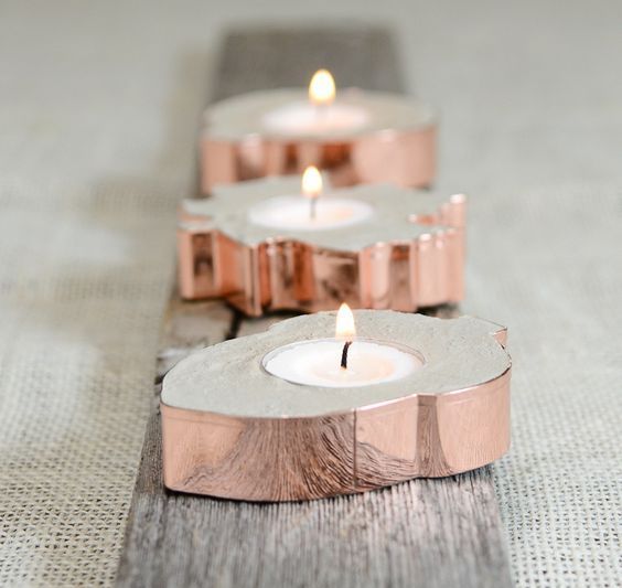 concrete and copper acorn candle holders with tealights are amazing for any kind of fall party