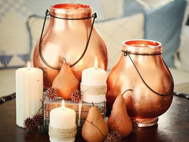 large copper candle lanterns and copper pears are great for creating a cozy fall centerpiece