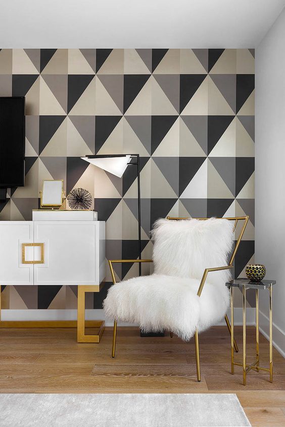 bright geometric wallpaper takes over the whole space here