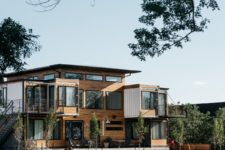 01 This home is built of shipping containers by its owner for this family, it’s clad with wood and metal for a cool rustic look