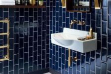 02 a navy tiled bathroom with white grout and gold fixtures looks timelessly elegant, gold metal features fit both masculine and feminine rooms