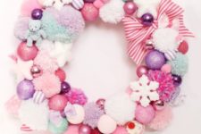 02 a sweet pastel Christmas wreath of pompoms, ornaments, bows and snowflakes of soft shades