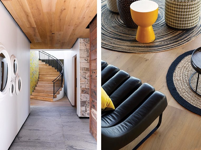 Elegant furniture, woven rugs, wood and stone create a unique ambience with a strong African influence