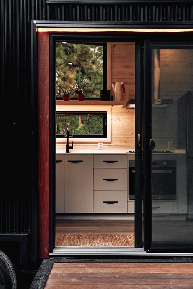 The doors are glass sliding ones to save the space and enjoy the views even when the doors are closed