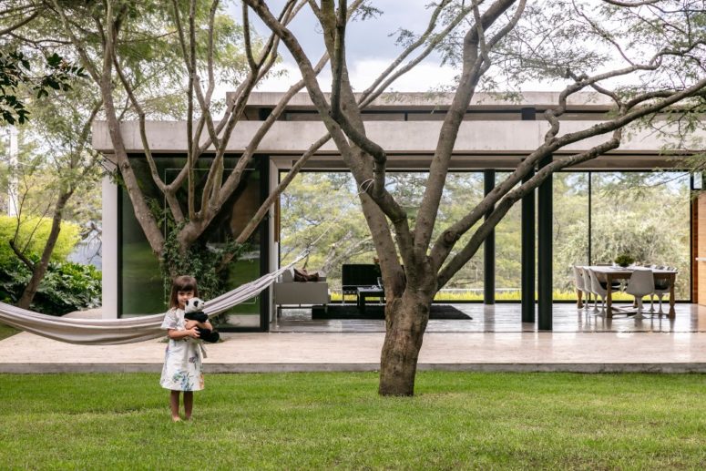 The house can be opened to outdoors anytime, there are sliding doors and glazed walls