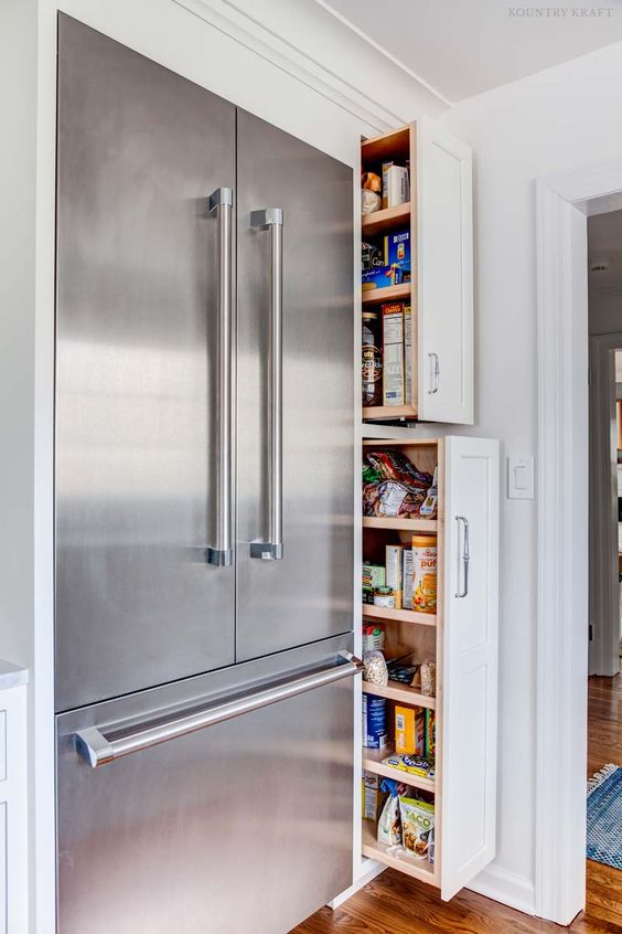 stainless steel fridges are a standard modern solution, which isn't that costly and works great for many styles
