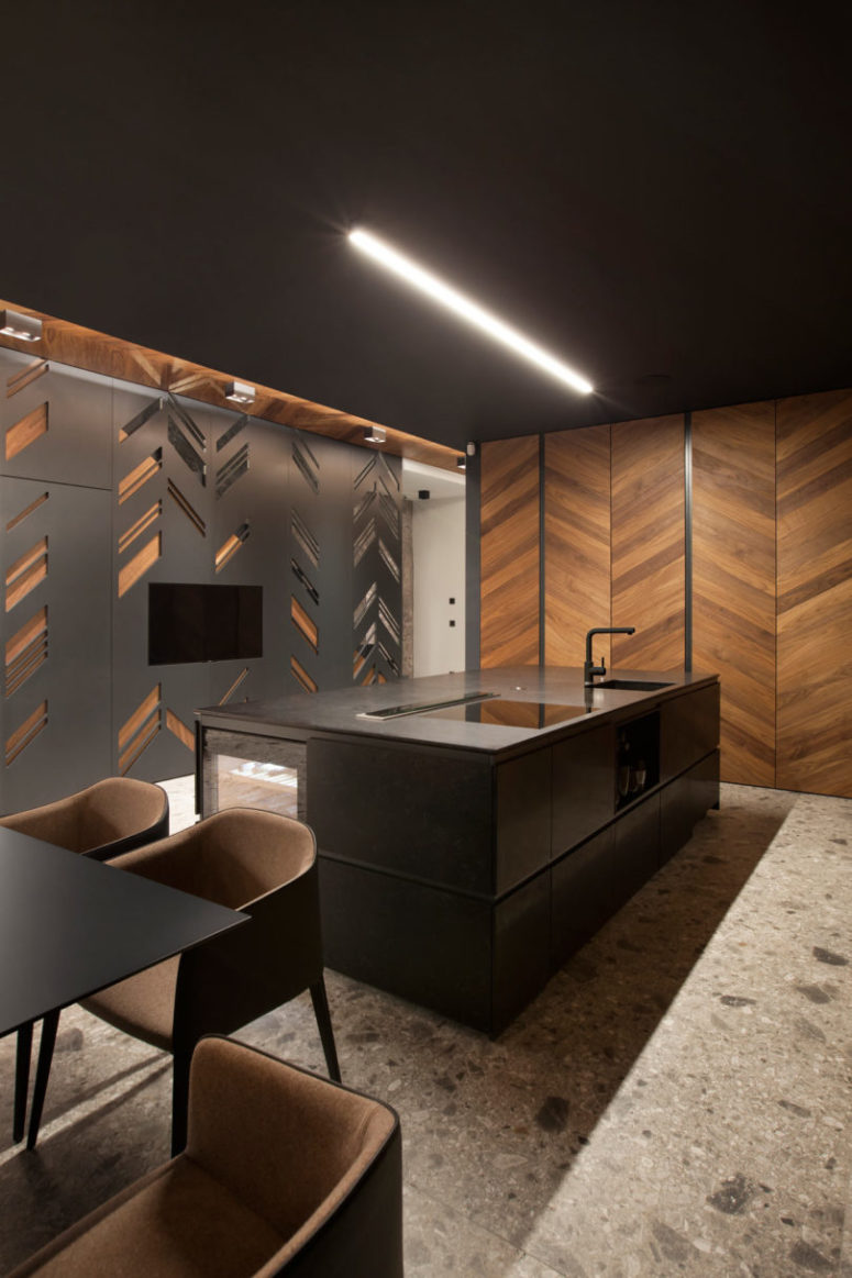 geometric patterns are great to decorate any wall This chevron pattern is repeated on a metal screen opposite the kitchen