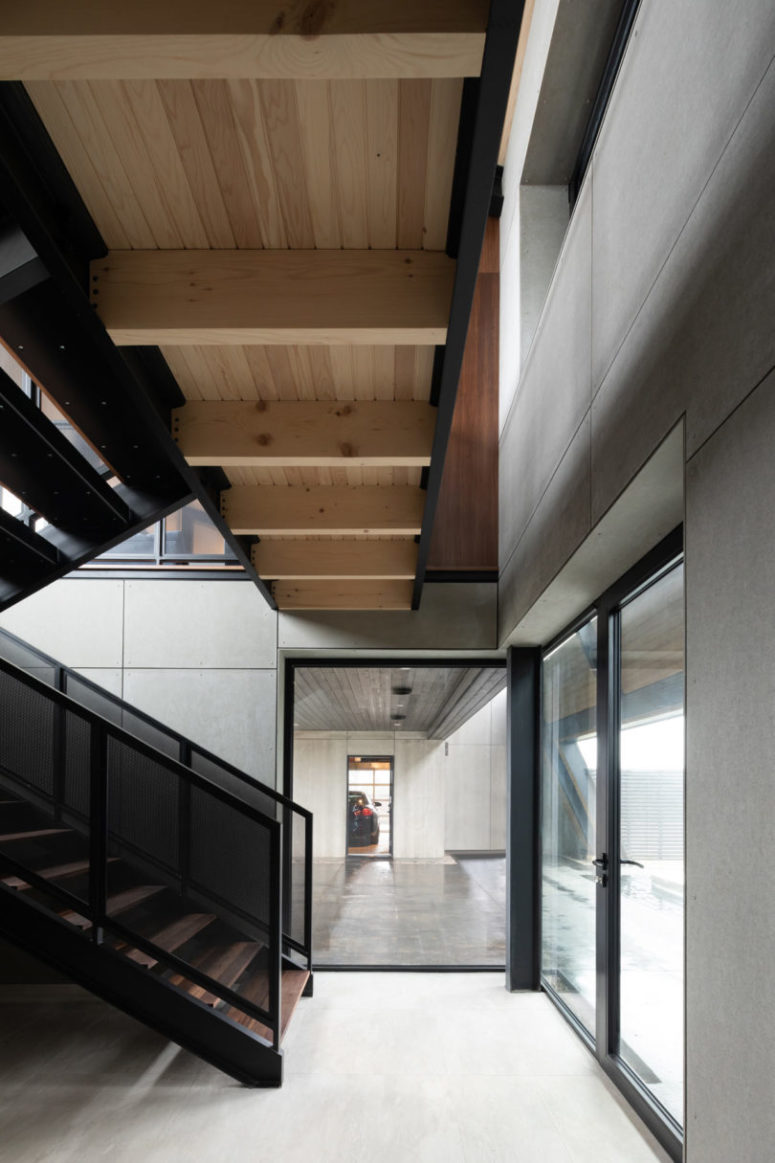 The spaces are done in minimalist style, there's much concrete, wood and plywood and blackened metals The spaces are done in minimalist style, there's much concrete, wood and plywood and blackened metals