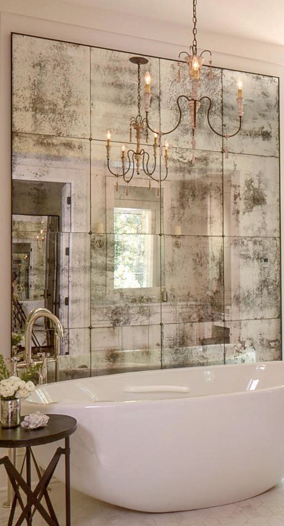 a vintage mirror wall will make your bathroom refined, chic and vintage-like at once and will bring old Hollywood glam