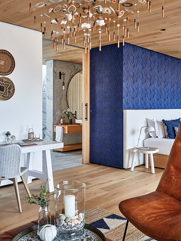 There are custom made items for the house, for example, this amazing shell and wood chandelier