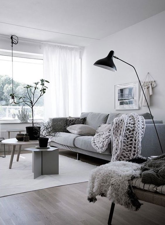 a traditional color palette for Scandi spaces is grey, black and white