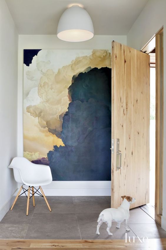 artworks, especially extra large ones, are a great idea to add a masculine feel to the space