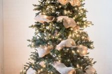 09 a simple rustic Christmas tree idea with pinecones, burlap ribbons and lights all over – you won’t need more